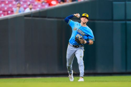 Brewers pick up 10-7 win over Reds in another wild game