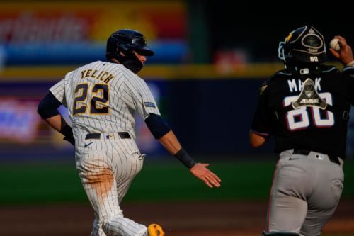 Brewers run wild over Marlins in 8-6 victory