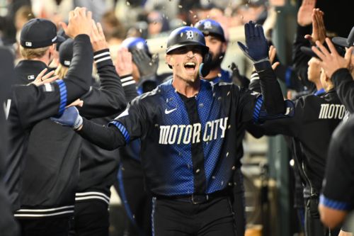 Tigers launch three homers in series-opening win