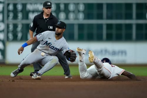 Marlins complete their first triple play in decades, can't beat Astros as losing skid continues