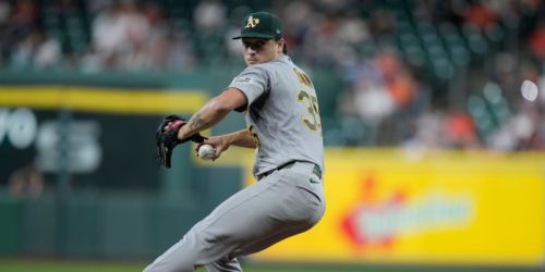 A's place Ginn (elbow) on IL, but aren't ruling out return before season's end
