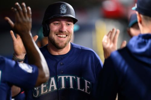 Mariners score three runs, two broken bats, beat Angels in extras