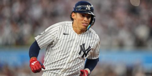 Lombard homers for 1st hit, shines on 'D' in debut he -- and Yanks -- won't forget