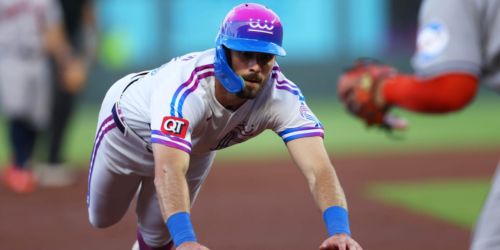 Royals' furious rally falls just short in 18-run, 23-hit affair