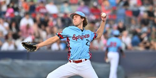 Rox prospect works out of jam in debut, with some help from a friend