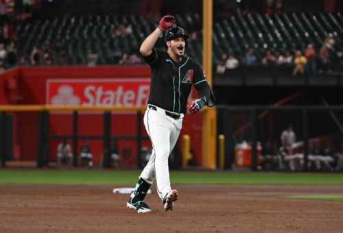 Diamondbacks cruise past Rockies 9-0, behind Arenado slam