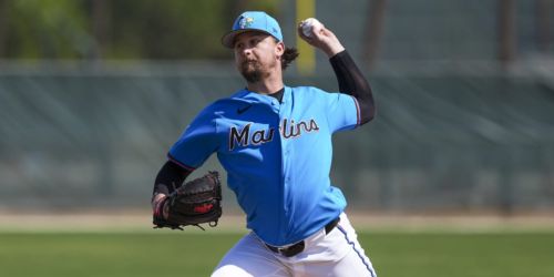 Back from TJ surgery, Garrett 'here to compete' for spot