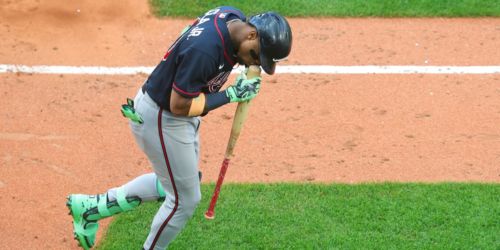 A slam and a smooch! Acuña kisses bat after clearing Green Monster