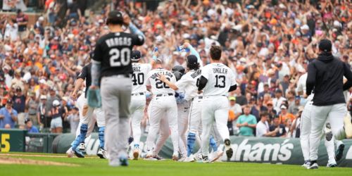 Jones sparks Tigers' late comeback on an emotional Father's Day