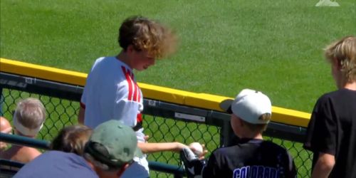 Two young fans hug it out after heartwarming act of kindness