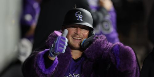 Goodman reaches 40-HR milestone, and Rockies want more