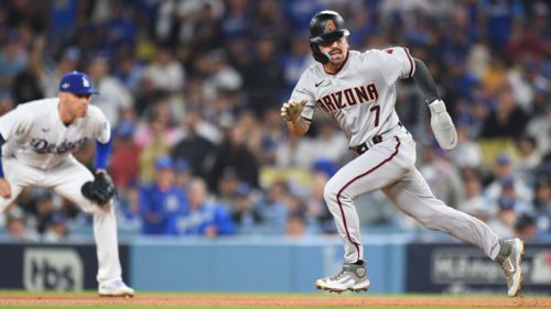 D-backs' Carroll (hand) hitless in spring debut