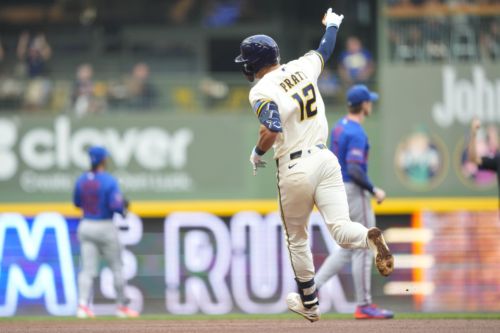 Brewers rough up Peralta in his return, take over league’s best record