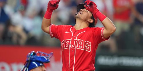 Lopez hits 1st Rangers HR vs. former team with a little help from above