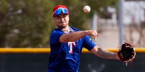 Injured Freeman embraces role as cheerleader