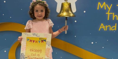 Fraley's 7-year-old daughter rings bell at hospital to signal victory over leukemia