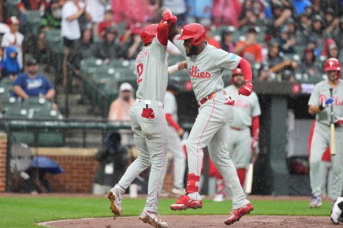 Clouds, Phillies rain on Orioles parade in 8-0, rain-shortened loss