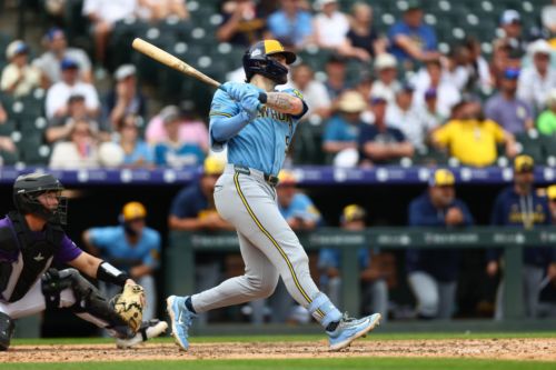 Offensive assault leads Brewers to 12-4 win and sweep over Rockies