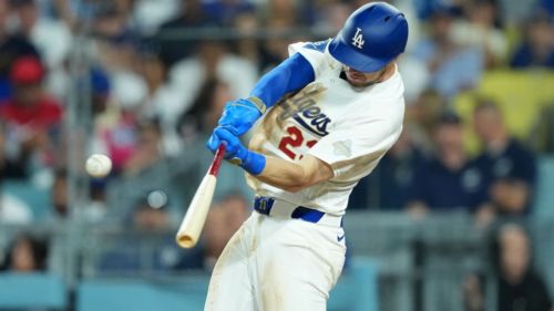 Tucker getting into groove as Dodgers win opener