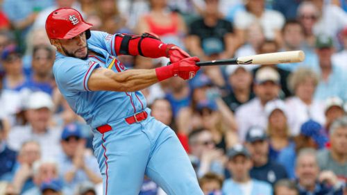 Which of these two sluggers should lay claim to the Cardinals' "moment of the year"?