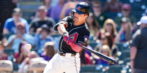 Carroll swings axe-handle bat to help injured hand in spring debut