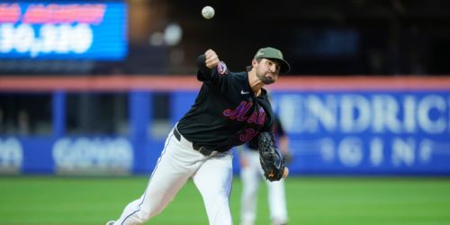 Holmes yields 2 runs, fans 2 in 1st Minor League rehab start