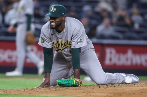 Yankees can’t put Athletics away early, lose late