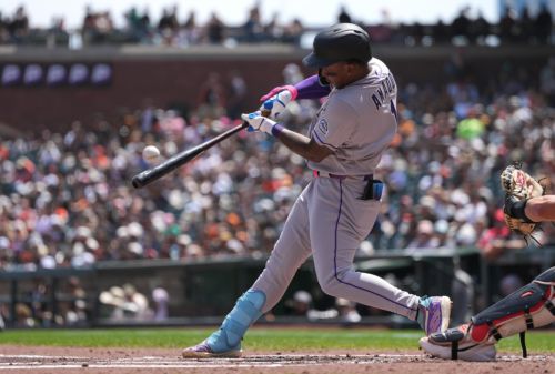 Rockies keep fighting, pull away from Giants in 13-7 win