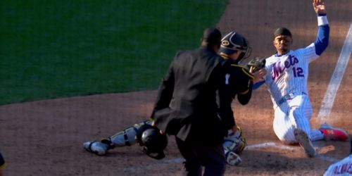 Lindor OK after play at plate, backs aggressive send