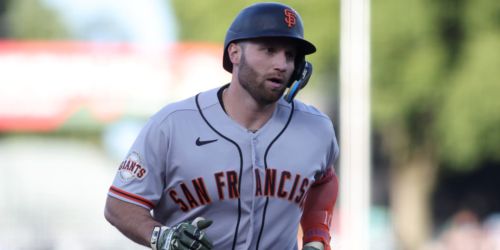 Schmitt's 2 homers back McDonald as Giants snap 3-game skid