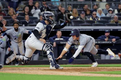 Yankees lose nightcap, AL East race to Rays, officially clinching division