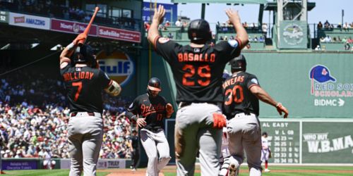 Explosive first inning carries O's to win at Fenway