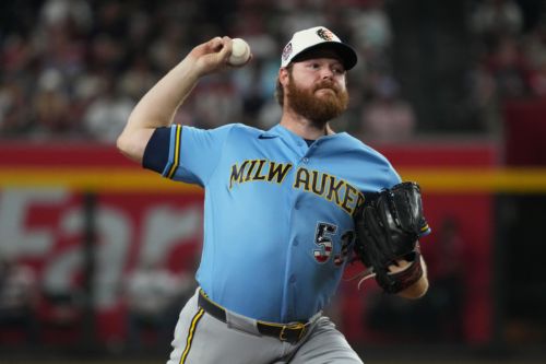 Injuries and stranded runners haunt the Brewers in a 4-3 loss