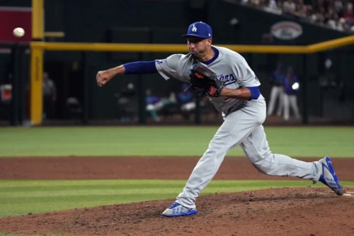 Dodgers snap 7-game losing streak in extras after Edwin Díaz blows another save