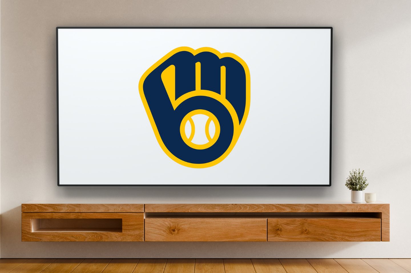 A tv displaying the Brewers logo.