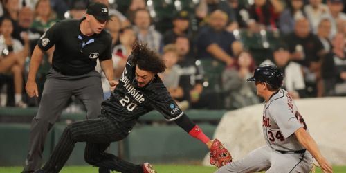 Vargas' 2 clutch web gems prove crucial in tight win over Tigers