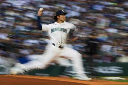 Bryan Woo dazzles, Mariners bash quartet of solo shots to breach .500