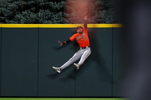 Cowser’s home run robbery seals rain-delayed win in Colorado, 2-1