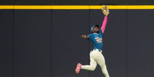 Saving the game with a wall-crashing catch? Just another day for 'Air Lara'