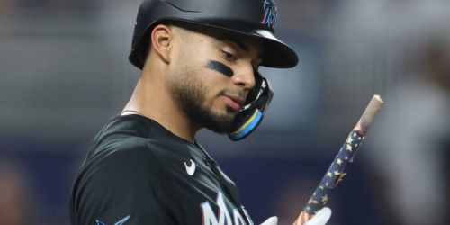 Jiménez designated for assignment; De Los Santos recalled