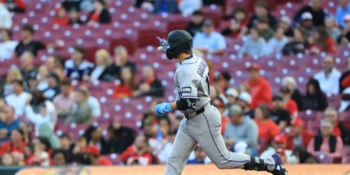 Goodman homers twice as Rockies respond with rout of Reds
