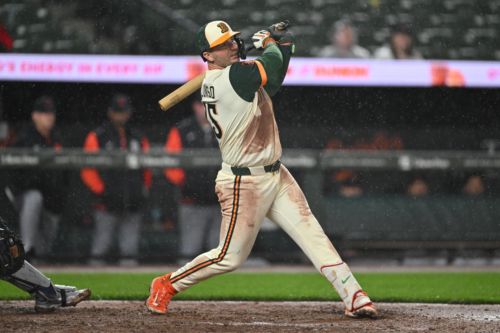 Orioles overcome Tigers and torrential rain with 7-4 win
