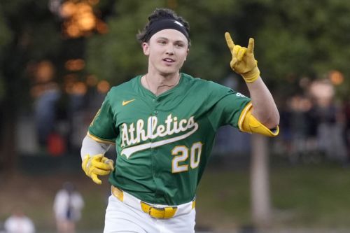 Athletics defeat the Reds 9-7