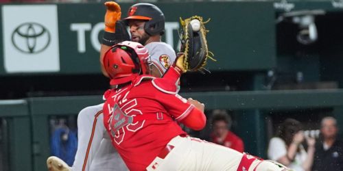 Pivotal play at plate doesn't go O's way on night Baz goes distance