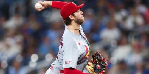 Cards put up 4 runs in 9th to back Liberatore's gem in Toronto