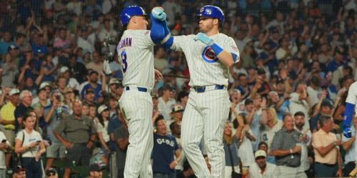 Cubs leave 'em loaded in 9th before dropping opener in extras
