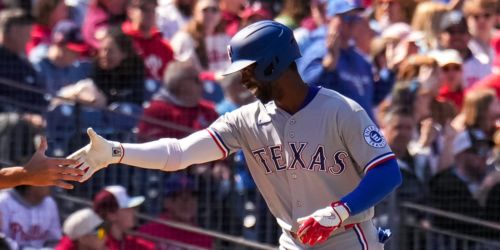 McCutchen celebrates first Rangers HR by ... apologizing to a fan?